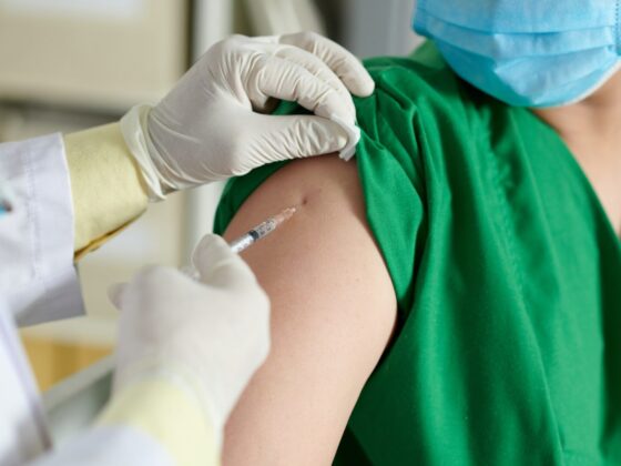 Doctor Making Injection of Vaccine